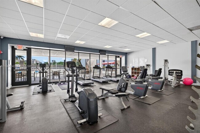 Building Photo - 3675 N Country Club Dr