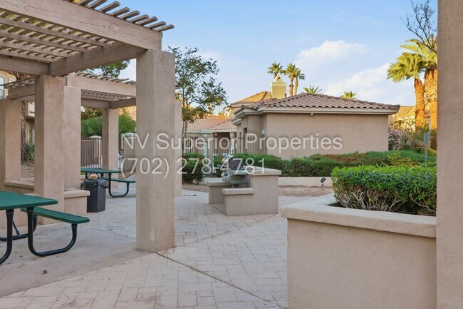 Building Photo - SW!!! 2 Bedroom Condo 1st Floor!! 2 Garage!! Gated!! Community Pool!! Fitness Room!! 2 Primary Be...