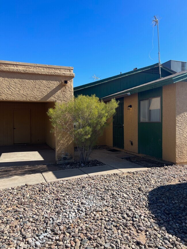 front private entry & carport with storage - 8257 W Santa Cruz Blvd