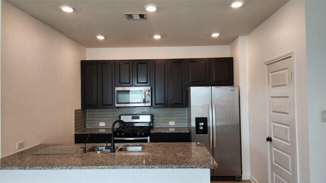 Building Photo - 9818 Mls Fld Dr