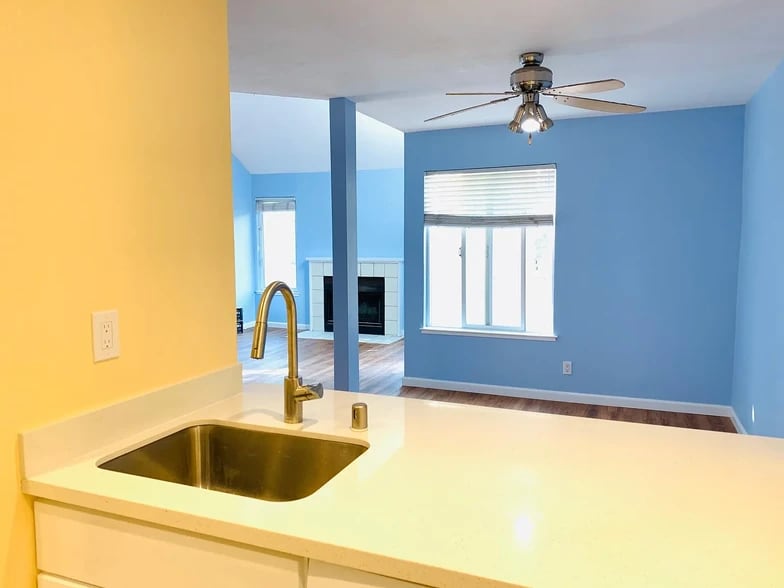 View from kitchen to dining and living room - 5318 Borneo Cir