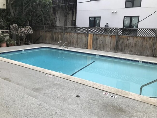 New pool, very well maintained. - 1909 Pelham Ave