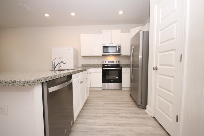 Building Photo - Pet-Friendly 3BR Townhome in Meadow Brook ...