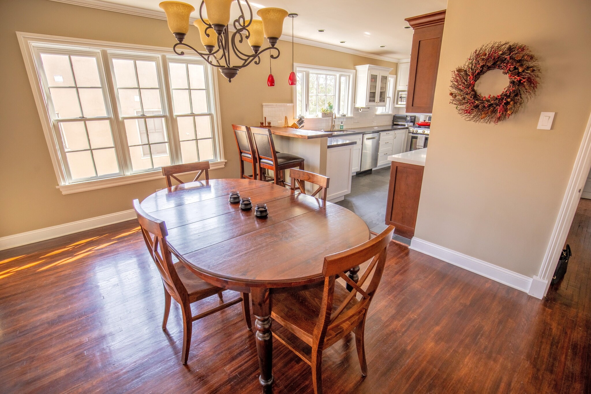 Oak breakfast bar open to dining. - 1327 S Sycamore Ave