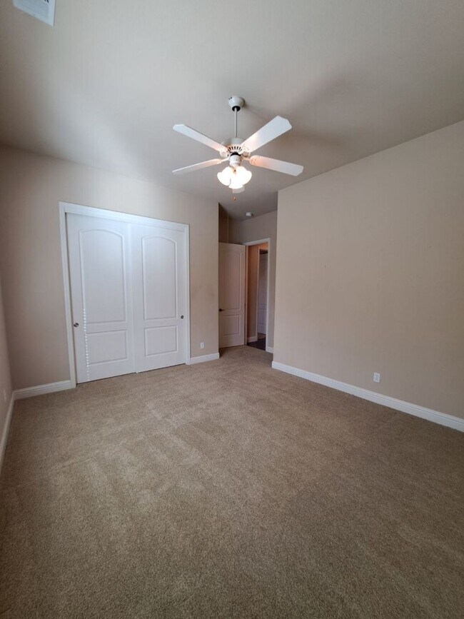 Building Photo - Custom Clovis Residence in Gated Community | Spacious Layout & 3-Car Garage!