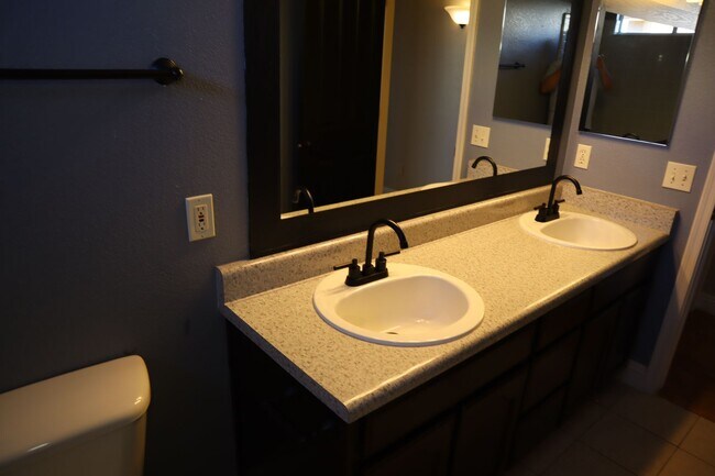 Building Photo - Home With A Pool and Much More!