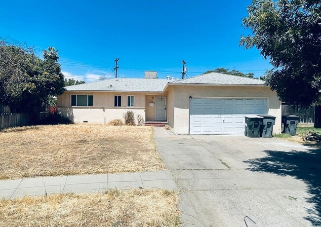 Building Photo - Thesta Treasure: Your Fresno Dream Home Aw...