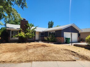 Building Photo - 4 bedroom, 2 bath, 2 car garage