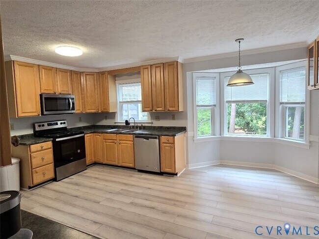Building Photo - 8312 Soft Wind Dr