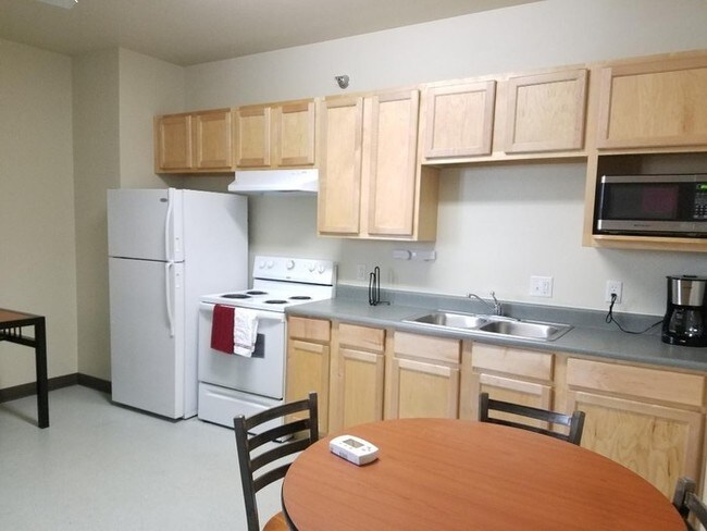 Building Photo - Furnished, main level studio apartment