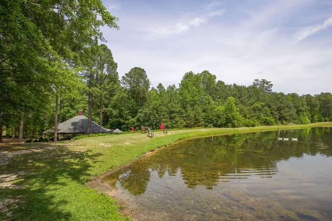 Building Photo - "Spacious 4-Bedroom, 2.5 Bath Gem with Law...