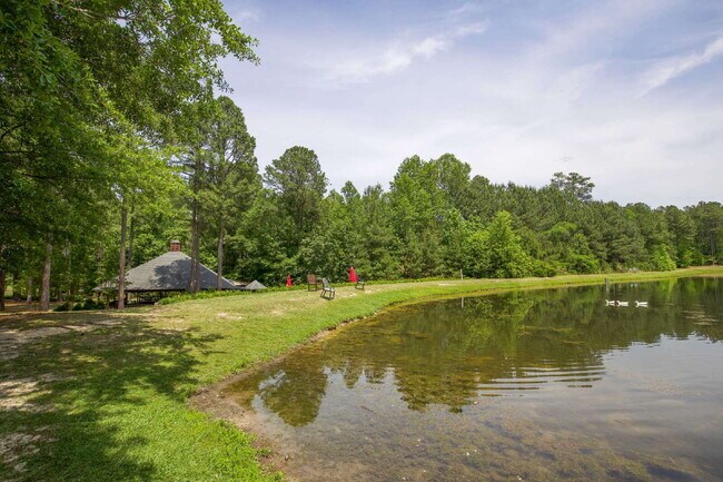 Building Photo - "Spacious 4-Bedroom Gem with 2.5 Baths at ...