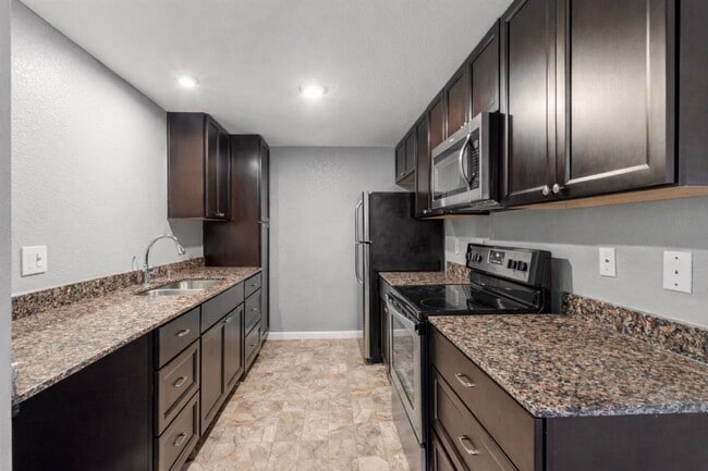 Building Photo - 2-Bedroom, 2-Bathroom End Unit with Covered Balcony