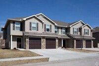 Building Photo - Beautiful Serrano Townhome with FULLY FINISHED Walk-out Basement