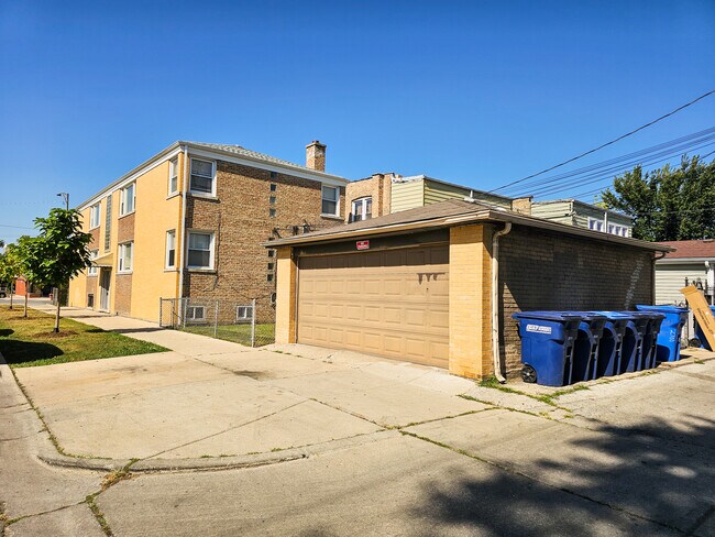 Building Photo - 5950 W Schubert Ave