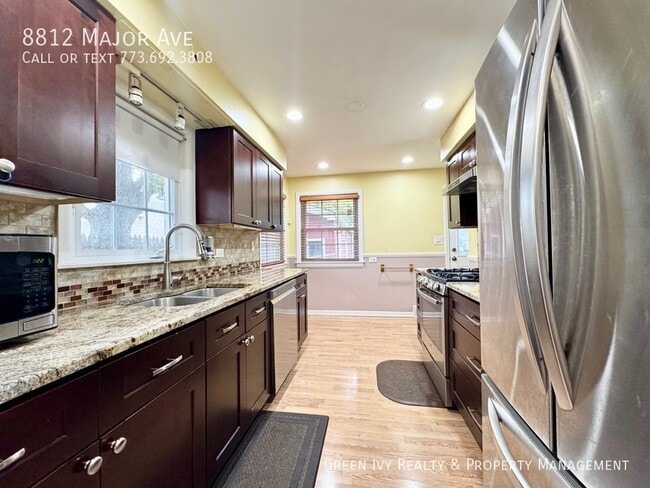 Building Photo - 8812 Major Ave