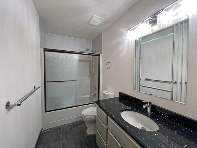 Building Photo - Stunning 4 Bedroom 2.5 Bath with Peek-a-Boo View of Puget Sound