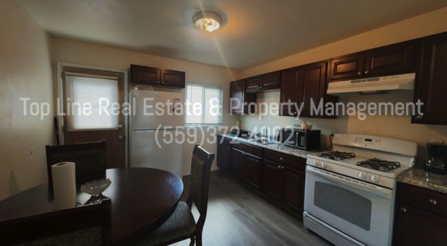 Building Photo - Spacious and well-located duplex in the he...
