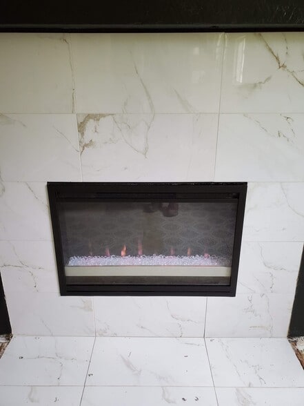Updated electric fireplace with remote - 7091 Beech Street