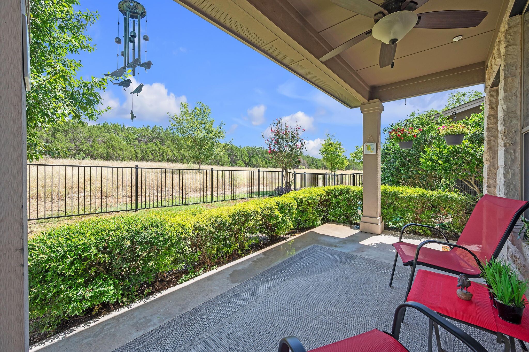 Patio with views of open space behind unit - 9201 Brodie Ln