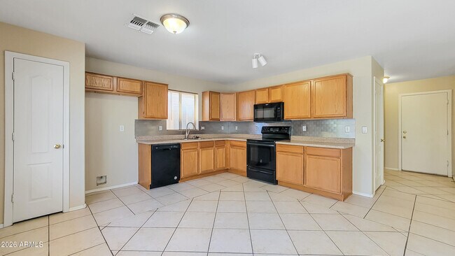 Building Photo - 12933 W Fleetwood Ln