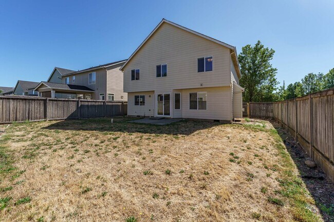 Building Photo - Your Next Home Awaits! 4BR/2.5BA with Fenc...