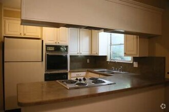 Building Photo - 3 bedroom 1 1/2 baths featuring large bed...