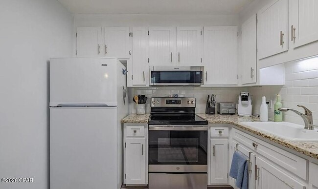 Building Photo - 17462 Front Beach Rd