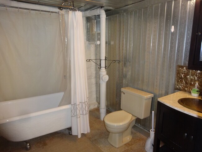 basement bathroom with claw tub - 48 Sherman Pl