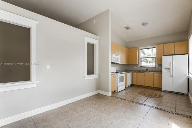 Building Photo - 1695 NE 37th Pl