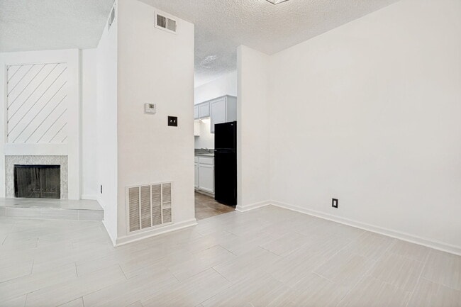 Building Photo - Spacious Dallas Condo with Unbeatable Storage, Private Patio & Carport