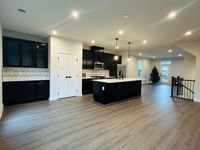 Building Photo - New Construction • 4 BR • 2 Full / 2 Half BA • End Unit Townhome in Village Town – Fayetteville’s...