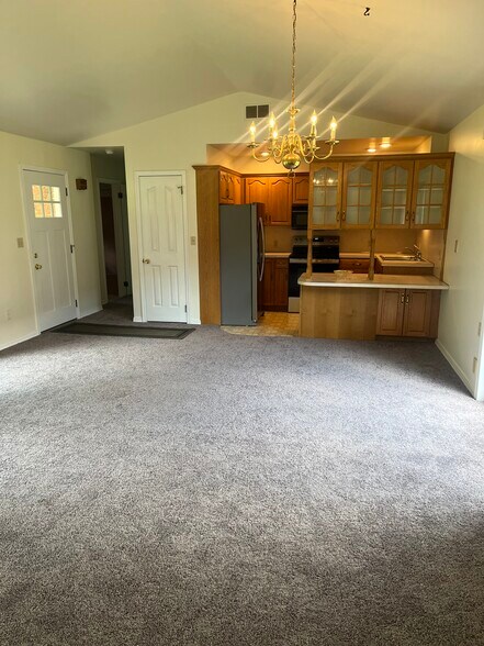 Living room to kitchen - 777 S Mink Rd