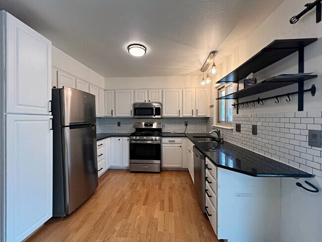 Building Photo - Charming Aurora Retreat with Gardener's Paradise Backyard - Pet Friendly