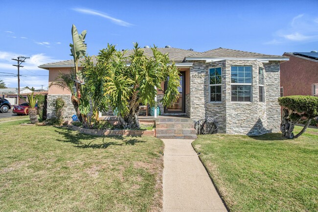 Building Photo - Stunning Remodeled Corner-Lot Home – An En...