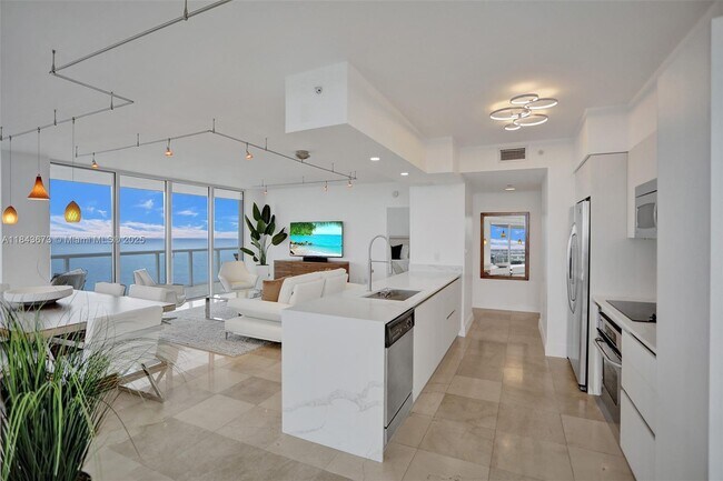 Building Photo - 6365 Collins Ave