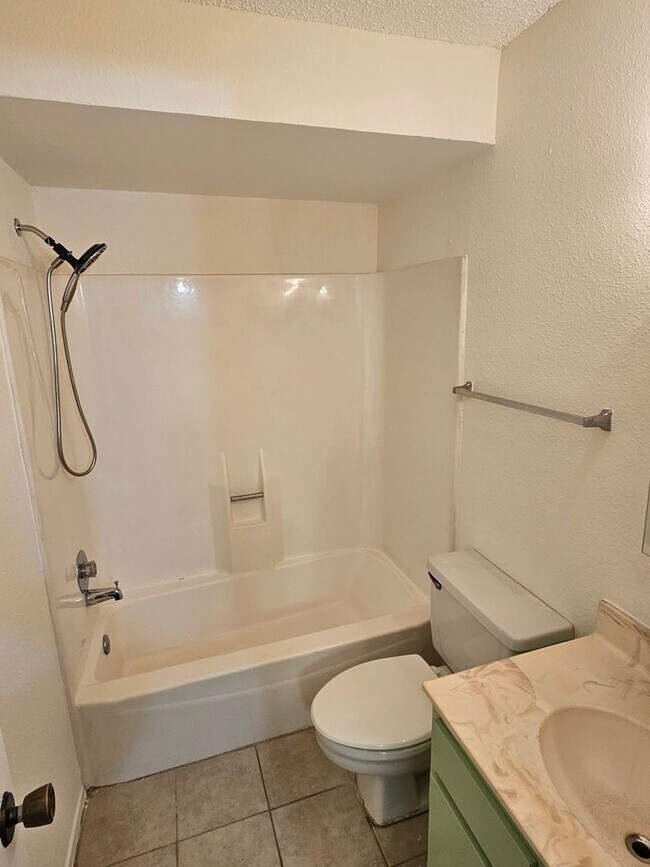 Building Photo - Beautifully Updated 2BR/2BA with Loft Oasis – Safe & Gated Community