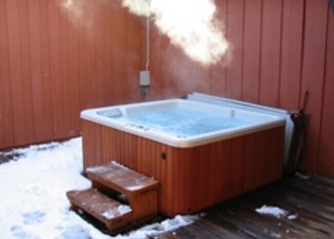 Building Photo - Unique open design,wood beams in all rooms-Very cheery and cozy. Newly remodeled, and newly furni...