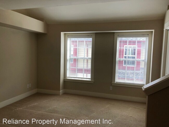 Building Photo - Stunning Tri-Level Condo with Open Concept Layout, Loft, and Private Patio!