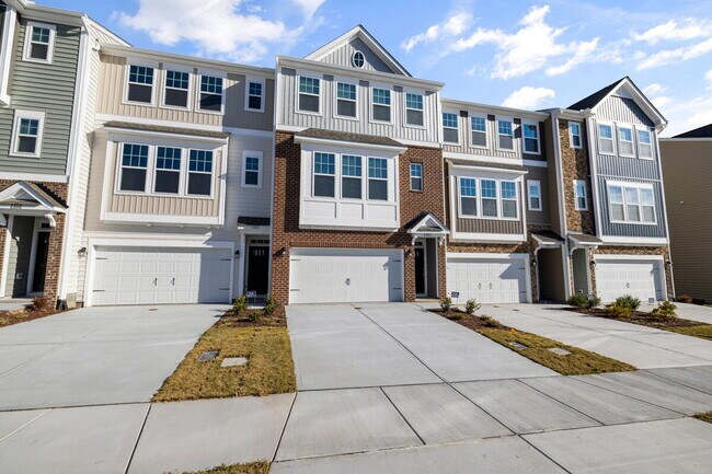 Building Photo - Available 08/15! Spacious Townhome in Prime Andrew Chapel Community