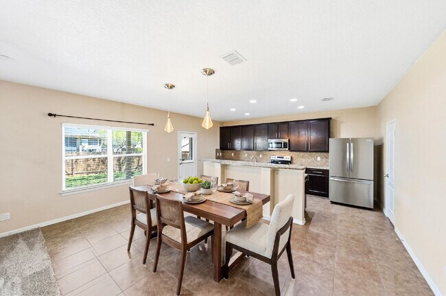 Building Photo - Where Game Nights, Backyard Gatherings, and Quiet Evenings Come Together