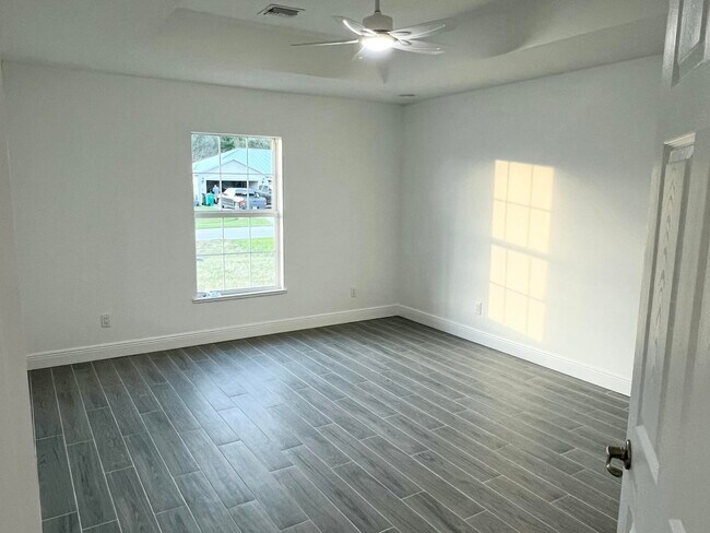 Building Photo - 5797 NW Coosa Dr