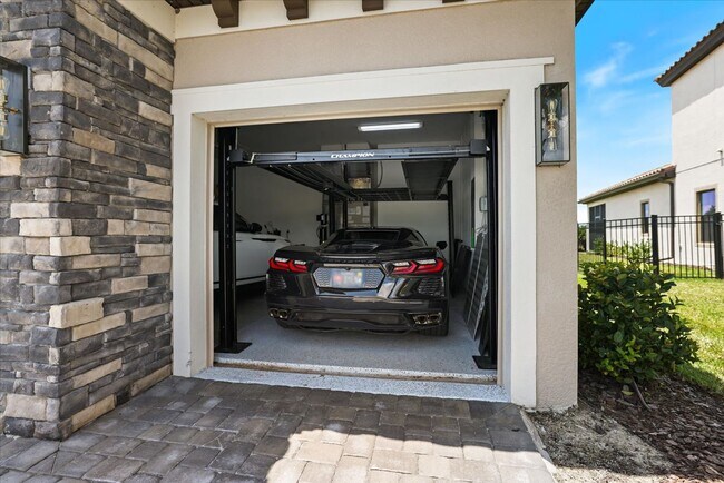 Building Photo - Luxury Home w/ Pool, Outdoor Kitchen, Car Lift, & Water View In Parrish!