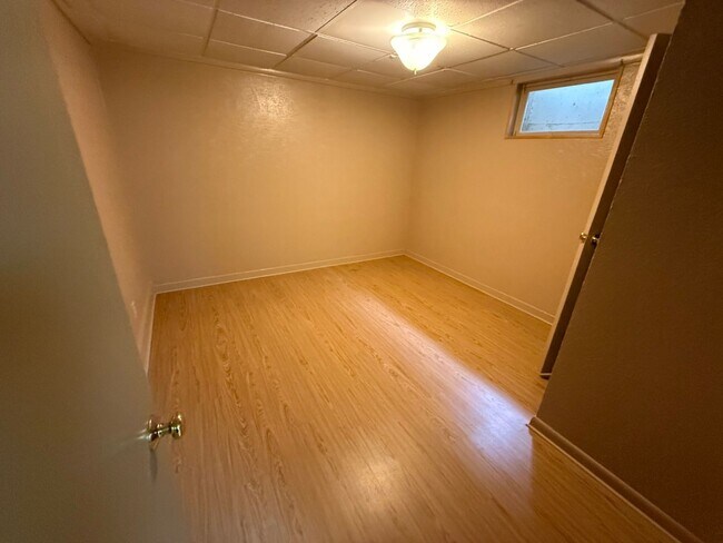 Building Photo - 4 Bedroom 2 Bathroom Home on Large Corner Lot with 2 Car Attached Garage In Great Neighborhood In...