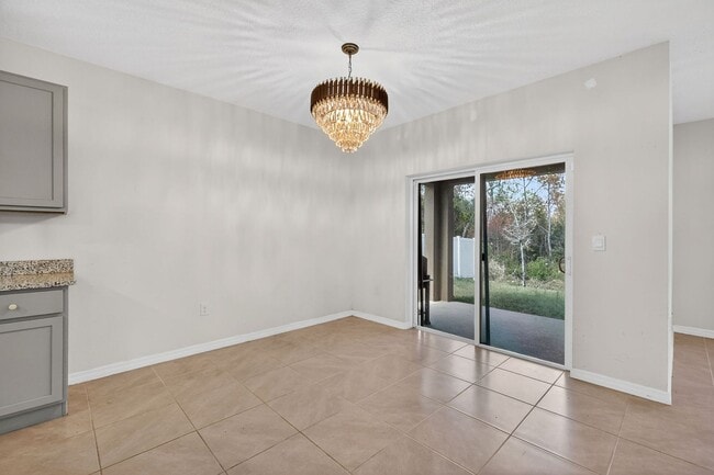 Building Photo - Available Now in Tavares | 2023 Built 4BR/2BA Home with 2-Car Garage