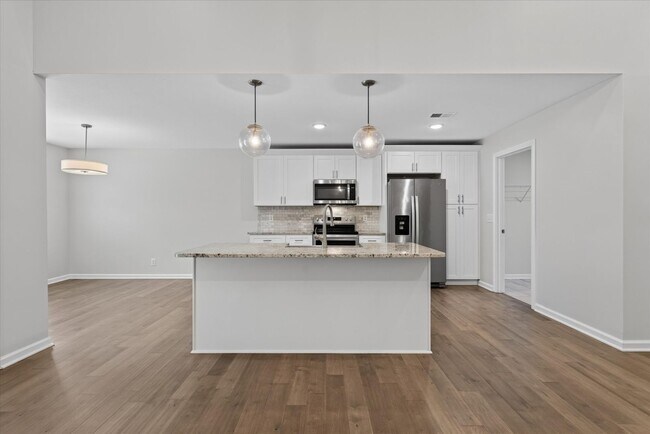 Building Photo - Like New Three Bedroom with Bonus!