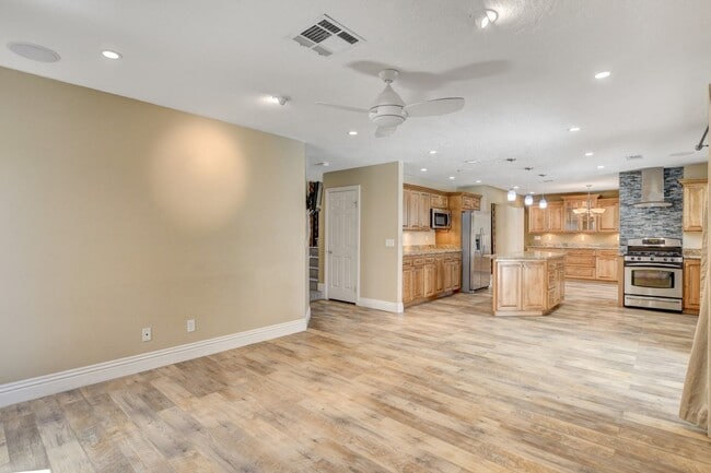 Building Photo - Gorgeous 4 Bedroom, 2 Story Home with a Beautiful Pool in the Lakes!