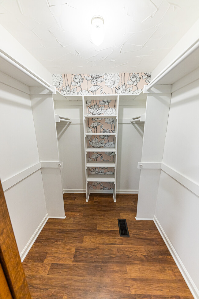 Walk in closet in primary suite - 3140 Buckmoor Ct