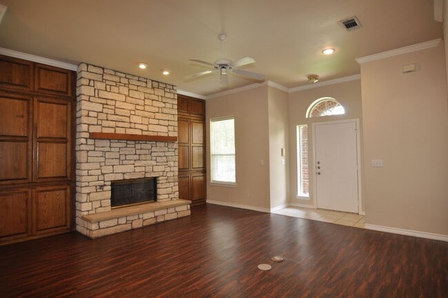 Building Photo - Welcome to this charming 3-2-2 brick home ...