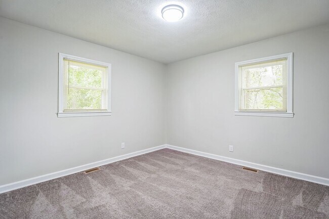 Building Photo - 4BR Brick Ranch with Upgrades & Room to Feel at Home!